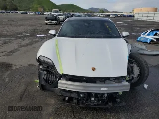 2021 Porsche Taycan 4S z VIN WP0AB2Y14MSA42272, wystawiony jako Copart lot #38038033 z przebiegiem 8 041 mil mil oraz . Historia ofert i sprzedaży dostępna na DreamBid. Obrazek 5.