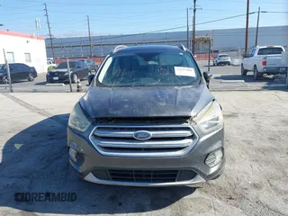 2018 Ford Escape Titanium with VIN 1FMCU0J98JUA03474, listed as a IAAI auction lot 37677880 with 106,423 mi miles and . Bid and sale history available at DreamBid. Image 12.