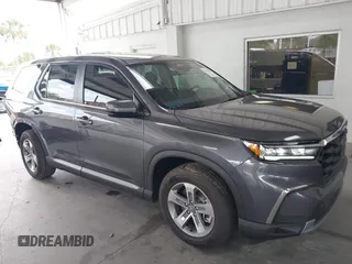 2025 Honda Pilot EX-L z VIN 5FNYG2H40SB019525, wystawiony jako IAAI lot #42190029 z przebiegiem 10 794 mil mil oraz . Historia ofert i sprzedaży dostępna na DreamBid. Obrazek 14.