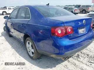 2009 Volkswagen Jetta SE z VIN 3VWRZ71K99M159242, wystawiony jako IAAI lot #42200917 z przebiegiem 226 285 mil mil oraz . Historia ofert i sprzedaży dostępna na DreamBid. Obrazek 3.