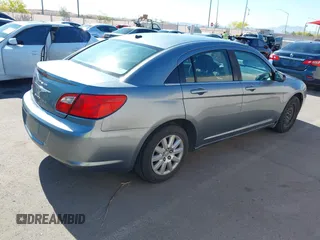 2010 Chrysler Sebring Touring z VIN 1C3CC4FB4AN173629, wystawiony jako IAAI lot #42219561 z przebiegiem 145 054 mil mil oraz . Historia ofert i sprzedaży dostępna na DreamBid. Obrazek 4.
