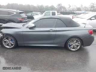 2015 BMW 2 Series M235i with VIN WBA1M1C50FV393092, listed as a IAAI auction lot 41507537 with 79,321 mi miles. Bid and sale history available at carsss.com. Image 14.
