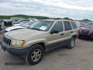 2001 Jeep Grand Cherokee Laredo with VIN 1J4GW48S51C566319, listed as a IAAI auction lot 42184875 with 148,471 mi miles and . Bid and sale history available at DreamBid. Image 2.