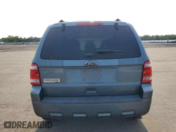 2011 Ford Escape XLT с VIN 1FMCU9D7XBKC51494, выставлен на аукционе Copart как лот 60563505 с пробегом 225 573 миль миль и Чистый • Clean title. История ставок и продаж доступна на DreamBid. Изображение 6.