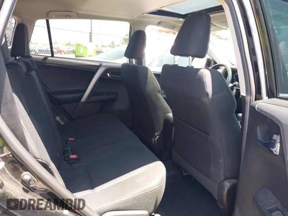 2018 Toyota RAV4 XLE with VIN 2T3WFREV2JW447623, listed as a IAAI auction lot 42410168 with 84,800 mi miles and . Bid and sale history available at DreamBid. Image 8.