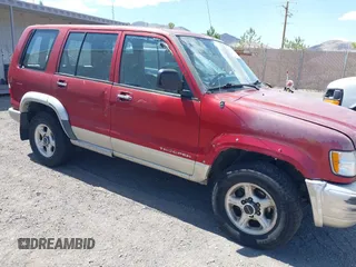 1999 Isuzu Trooper S with VIN JACDJ58X5X7928609, listed as a IAAI auction lot 42098158 with 159,674 mi miles and . Bid and sale history available at DreamBid. Image 6.