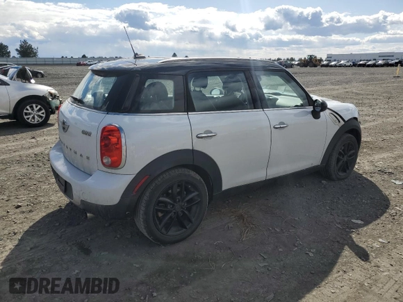 2015 MINI Countryman with VIN WMWZB3C50FWR44801, listed as a Copart auction lot 51957715 with 69,537 mi miles and Salvage Title. Bid and sale history available at DreamBid. Image 3.