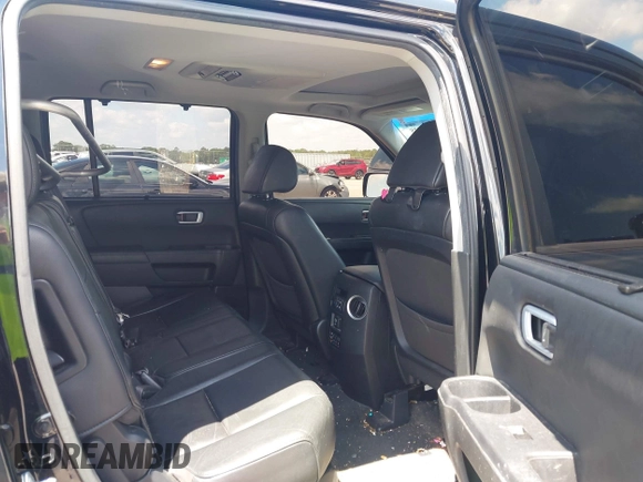 2013 Honda Pilot Touring z VIN 5FNYF3H98DB023104, wystawiony jako IAAI lot #42310538 z przebiegiem 169 385 mil mil oraz . Historia ofert i sprzedaży dostępna na DreamBid. Obrazek 8.