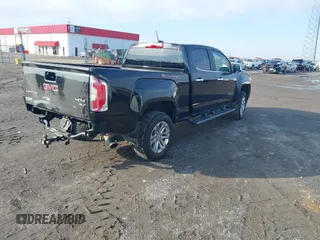 2015 GMC Canyon 4WD SLT with VIN 1GTG6CE34F1153369, listed as a IAAI auction lot 41277810 with 135,821 mi miles. Bid and sale history available at carsss.com. Image 4.
