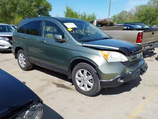 2007 Honda CR-V EX-L z VIN JHLRE387X7C073092, wystawiony jako IAAI lot #42090276 z przebiegiem 150 297 mil mil oraz . Historia ofert i sprzedaży dostępna na DreamBid. Obrazek 1.