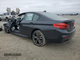 2019 BMW 5 Series M550i xDrive with VIN WBAJB9C53KB464298, listed as a Copart auction lot 59892105 with Not provided miles and Salvage title. Bid and sale history available at DreamBid. Image 2.