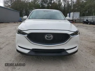 2021 Mazda CX-5 Grand Touring Reserve with VIN JM3KFBAY5M0320404, listed as a Copart auction lot 50405075 with 32,596 mi miles and Salvage Title. Bid and sale history available at carsss.com. Image 5.