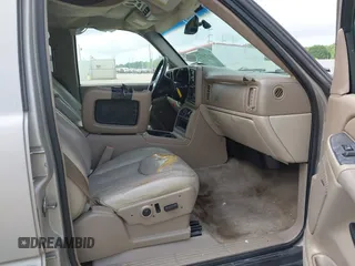 2004 Chevrolet Suburban LT with VIN 1GNEC16Z34J268718, listed as a IAAI auction lot 42078372 with 433,488 mi miles and . Bid and sale history available at DreamBid. Image 5.