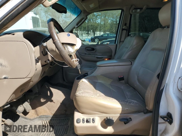2002 Ford F-150 XLT with VIN 1FTRW07L32KE29159, listed as a Copart auction lot 50596125 with 198,058 mi miles and Salvage Title. Bid and sale history available at carsss.com. Image 7.