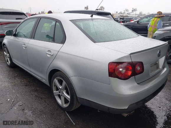 2009 Volkswagen Jetta Sedan S with VIN 3VWJZ71K29M148712, listed as a IAAI auction lot 41724523 with 112,043 mi miles. Bid and sale history available at carsss.com. Image 3.