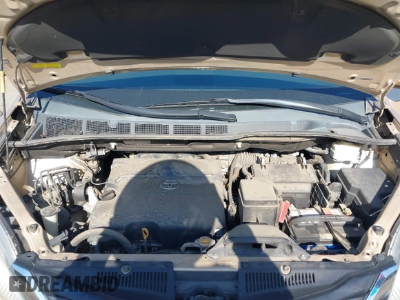 2012 Toyota Sienna LE AAS with VIN 5TDKK3DC5CS186077, listed as a IAAI auction lot 40265988 with 130,888 mi miles and . Bid and sale history available at DreamBid. Image 10.