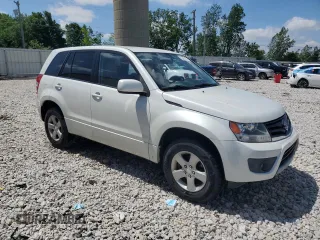2013 Suzuki Grand Vitara Premium z VIN JS3TD0D60D4100292, wystawiony jako Copart lot #55451994 z przebiegiem 78 836 mil mil oraz Czysty tytuł • Clean title. Historia ofert i sprzedaży dostępna na DreamBid. Obrazek 4.