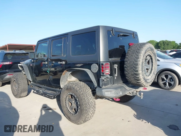 2015 Jeep Wrangler Unlimited Rubicon Hard Rock with VIN 1C4HJWFG7FL602344, listed as a IAAI auction lot 42011914 with 109,238 mi miles and . Bid and sale history available at DreamBid. Image 14.