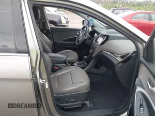 2017 Hyundai Santa Fe Ultimate z VIN 5XYZWDLA4HG441962, wystawiony jako IAAI lot #42144550 z przebiegiem 124 627 mil mil oraz . Historia ofert i sprzedaży dostępna na DreamBid. Obrazek 5.