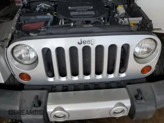 2012 Jeep Wrangler Arctic z VIN 1C4GJWBG2CL237343, wystawiony jako Copart lot #64674015 z przebiegiem 72 750 mil mil oraz Szkoda całkowita • Salvage title. Historia ofert i sprzedaży dostępna na DreamBid. Obrazek 11.