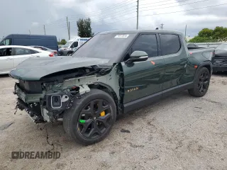 2023 Rivian R1T Adventure z VIN 7FCTGAAA8PN001040, wystawiony jako Copart lot #71517874 z przebiegiem 19 789 mil mil oraz Szkody całkowita. Historia ofert i sprzedaży dostępna na DreamBid. Obrazek 1.