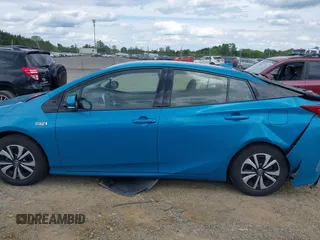 2017 Toyota Prius Plus z VIN JTDKARFP4H3067953, wystawiony jako IAAI lot #42211132 z przebiegiem 90 760 mil mil oraz . Historia ofert i sprzedaży dostępna na DreamBid. Obrazek 14.