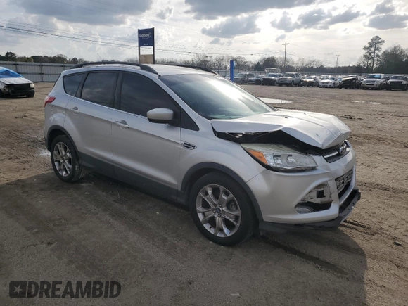 2015 Ford Escape SE with VIN 1FMCU0GX2FUB36390, listed as a Copart auction lot 49014075 with 108,115 mi miles and Salvage Title. Bid and sale history available at DreamBid. Image 4.