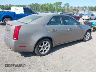 2008 Cadillac CTS RWD w/1SA with VIN 1G6DM577180116697, listed as a IAAI auction lot 42114604 with 184,224 mi miles. Bid and sale history available at carsss.com. Image 4.