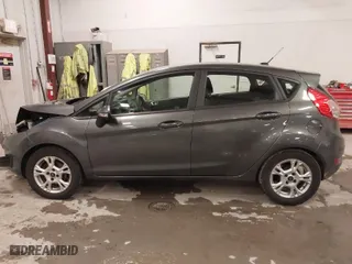 2015 Ford Fiesta SE with VIN 3FADP4EJ8FM138306, listed as a IAAI auction lot 41227124 with 106,741 mi miles. Bid and sale history available at carsss.com. Image 14.