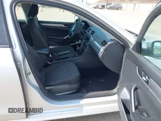 2013 Volkswagen Passat Wolfsburg Edition with VIN 1VWAP7A36DC000975, listed as a IAAI auction lot 42432637 with 109,431 mi miles and . Bid and sale history available at DreamBid. Image 5.