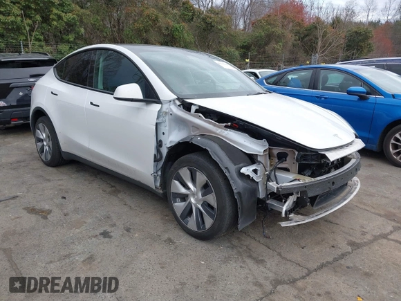2023 Tesla Model Y Long Range z VIN 7SAYGDEE4PF621640, wystawiony jako IAAI lot #41796502 z przebiegiem 68 484 mil mil oraz . Historia ofert i sprzedaży dostępna na DreamBid. Obrazek 1.