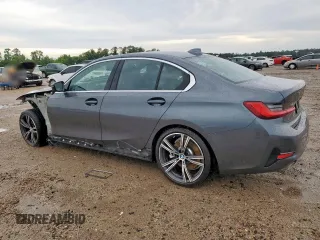 2021 BMW 3 Series 330i with VIN 3MW5R1J08M8B48101, listed as a Copart auction lot 57802525 with 47,604 mi miles and Salvage title. Bid and sale history available at DreamBid. Image 2.