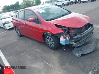 2021 Toyota Prius LE with VIN JTDL9MFU0M3029880, listed as a IAAI auction lot 42450003 with 91,558 mi miles and . Bid and sale history available at DreamBid. Image 1.