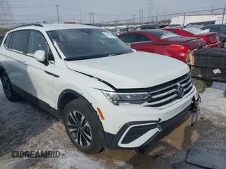 2024 Volkswagen Tiguan S with VIN 3VVFB7AX1RM103822, listed as a IAAI auction lot 41364247 with 10,407 mi miles and . Bid and sale history available at DreamBid. Image 1.