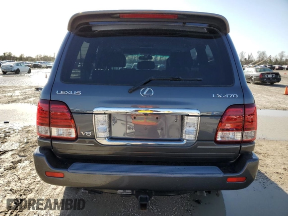 2006 Lexus LX 470 z VIN JTJHT00W664007502, wystawiony jako Copart lot #47871885 z przebiegiem 172 552 mil mil oraz Szkoda całkowita • Salvage title. Historia ofert i sprzedaży dostępna na DreamBid. Obrazek 6.