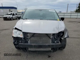 2019 Dodge Grand Caravan SE with VIN 2C4RDGBGXKR642247, listed as a Copart auction lot 54124295 with 153,163 mi miles and Salvage Title. Bid and sale history available at DreamBid. Image 5.