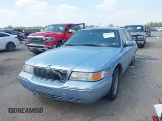2000 Mercury Grand Marquis LS z VIN 2MEFM75W1YX673105, wystawiony jako IAAI lot #42050980 z przebiegiem 154 944 mil mil oraz . Historia ofert i sprzedaży dostępna na DreamBid. Obrazek 17.