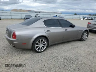 2005 Maserati Quattroporte z VIN ZAMCE39A050017377, wystawiony jako Copart lot #50191415 z przebiegiem 39 545 mil mil oraz Czysty tytuł • Clean title. Historia ofert i sprzedaży dostępna na DreamBid. Obrazek 3.