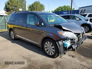 2014 Toyota Sienna Limited with VIN 5TDDK3DC8ES078175, listed as a Copart auction lot 61138585 with 98,527 mi miles and Salvage title. Bid and sale history available at DreamBid. Image 4.