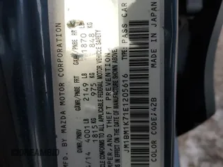 2014 Mazda 3 i Sport with VIN JM1BM1K71E1205616, listed as a Copart auction lot 44175665 with 61,667 mi miles and Clean Title. Bid and sale history available at DreamBid. Image 12.