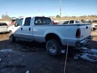 2000 Ford F-350 XL with VIN 1FTSW31F8YEA82117, listed as a Copart auction lot 82800154 with 236,161 mi miles and Salvage Title. Bid and sale history available at DreamBid. Image 2.