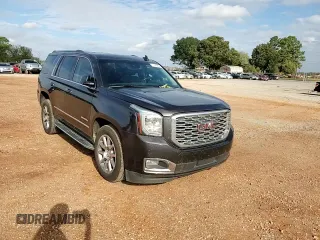 2018 GMC Yukon Denali with VIN 1GKS1CKJ4JR244135, listed as a Copart auction lot 71445964 with 148,375 mi miles and Salvage Title. Bid and sale history available at carsss.com. Image 11.