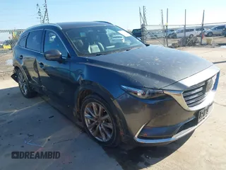 2019 Mazda CX-9 Grand Touring with VIN JM3TCADY8K0335429, listed as a IAAI auction lot 41203657 with 94,333 mi miles. Bid and sale history available at carsss.com. Image 1.