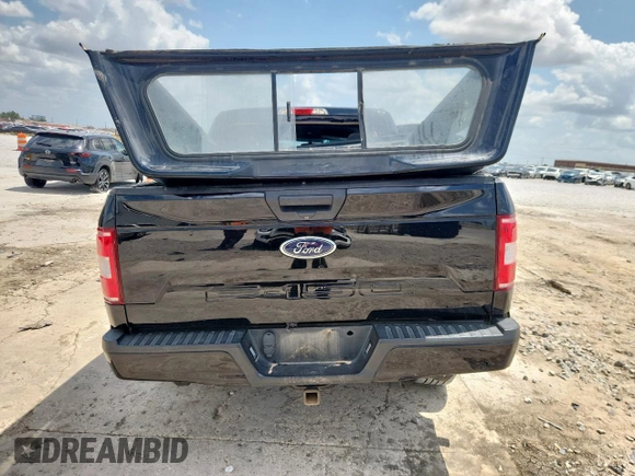 2018 Ford F-150 XL with VIN 1FTEW1E57JFC39493, listed as a Copart auction lot 61781395 with 129,871 mi miles and Salvage title. Bid and sale history available at DreamBid. Image 6.