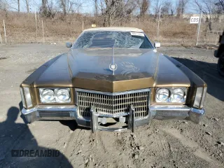 1971 Cadillac Eldorado z VIN 693671Q424620, wystawiony jako Copart lot #48917885 z przebiegiem Nie podano mil oraz Szkoda całkowita • Salvage title. Historia ofert i sprzedaży dostępna na DreamBid. Obrazek 5.