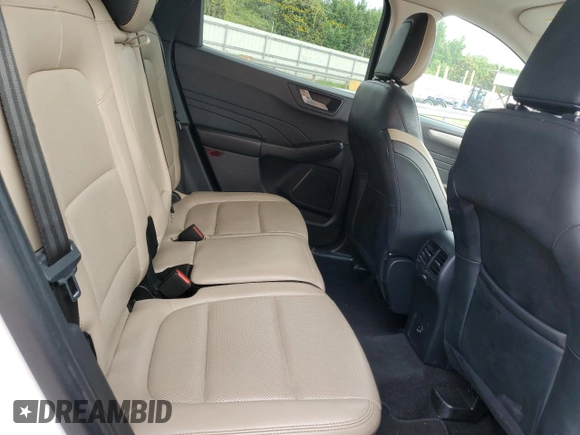 2021 Ford Escape SEL z VIN 1FMCU9H67MUA65291, wystawiony jako Copart lot #63403555 z przebiegiem 122 034 mil mil oraz Szkoda całkowita • Salvage title. Historia ofert i sprzedaży dostępna na DreamBid. Obrazek 11.