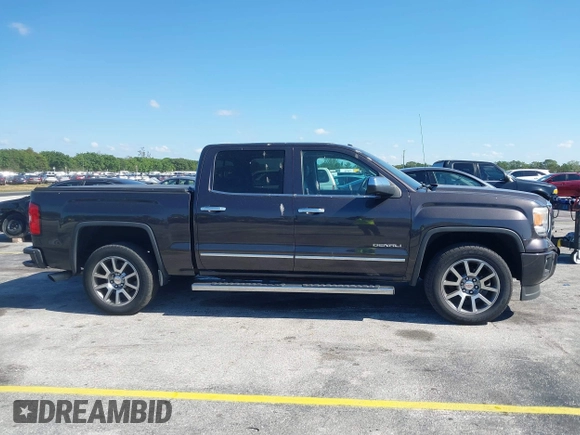 2015 GMC Sierra 1500 Denali with VIN 3GTU2WEC2FG422289, listed as a IAAI auction lot 42023170 with 165,856 mi miles and . Bid and sale history available at DreamBid. Image 14.