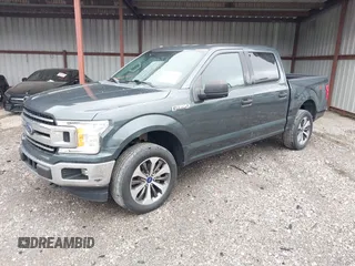 2018 Ford F-150 XL with VIN 1FTEW1EG4JKE17790, listed as a IAAI auction lot 42128519 with 153,740 mi miles. Bid and sale history available at carsss.com. Image 17.