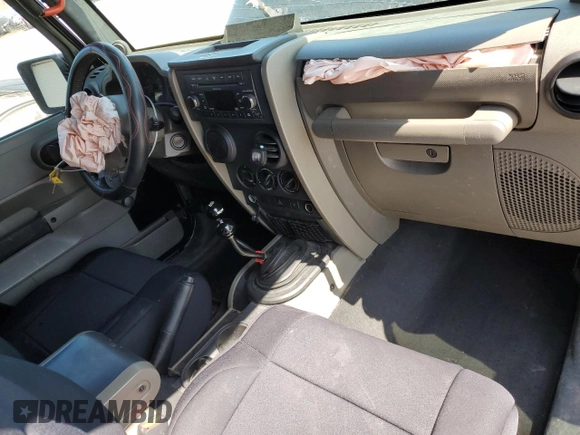 2009 Jeep Wrangler X with VIN 1J4FA24139L730383, listed as a Copart auction lot 51914935 with 168,265 mi miles and Salvage Title. Bid and sale history available at DreamBid. Image 8.
