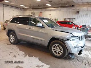 2019 Jeep Grand Cherokee Laredo E with VIN 1C4RJFAG8KC823814, listed as a IAAI auction lot 41728782 with 120,695 mi miles. Bid and sale history available at carsss.com. Image 1.
